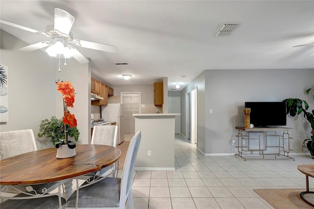 1400 Gandy Blvd N Unit 1504, Saint Petersburg, FL 33702 - dining area featuring light tile patterned floors, a ceiling fan, and baseboards