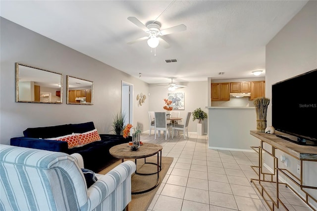 1400 Gandy Blvd N Unit 1504, Saint Petersburg, FL 33702 - living room with a ceiling fan, light tile patterned flooring, and baseboards