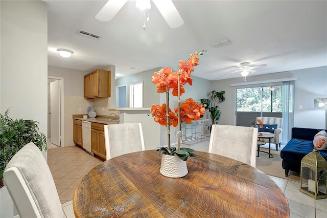 1400 Gandy Blvd N Unit 1504, Saint Petersburg, FL 33702 - dining room with a ceiling fan and light tile patterned floors