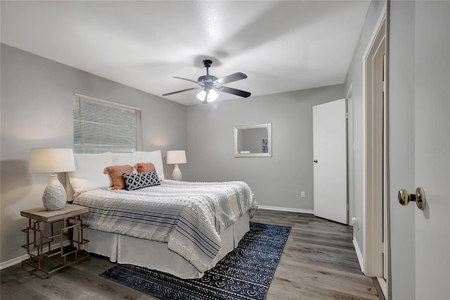 1400 Gandy Blvd N Unit 1504, Saint Petersburg, FL 33702 - bedroom with baseboards, wood finished floors, and ceiling fan