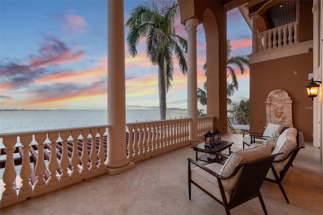 5810 Mariner St, Tampa, FL 33609 - balcony at dusk featuring a water view