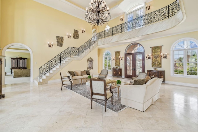 5810 Mariner St, Tampa, FL 33609 - building lobby with a towering ceiling, stairs, and crown molding