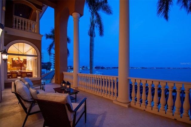 5810 Mariner St, Tampa, FL 33609 - view of patio featuring a balcony and a water view