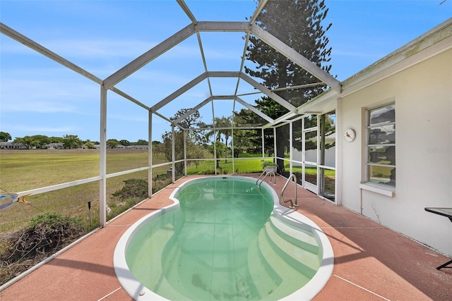 8305 Palencia Dr, Port Richey, FL 34668 - outdoor pool featuring a lawn, a patio area, and a lanai