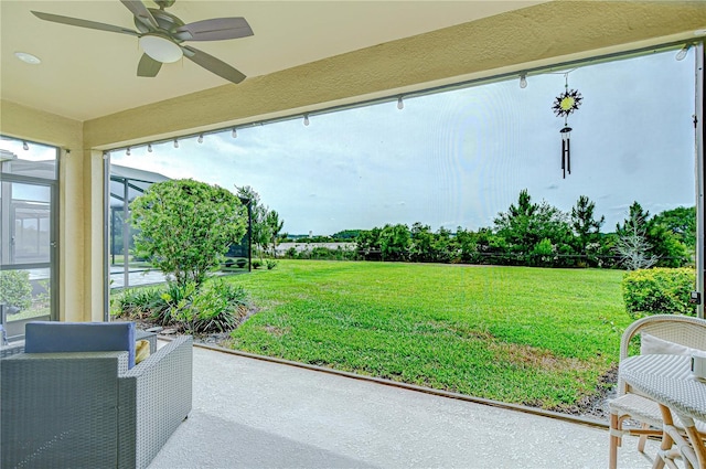 view of patio with ceiling fan