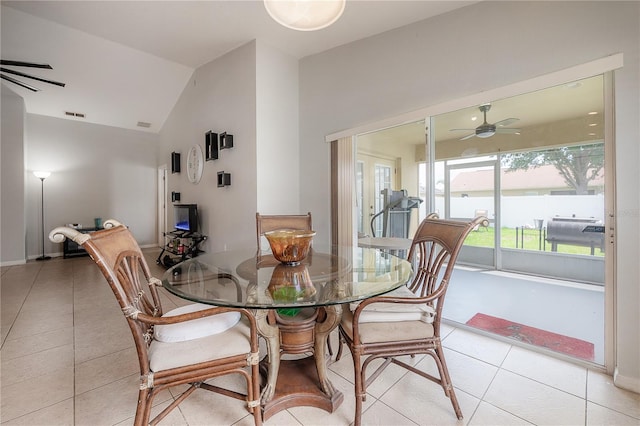 14614 Rannoch Moor Pl, Wimauma, FL 33598 - dining room with ceiling fan, lofted ceiling, and light tile patterned floors