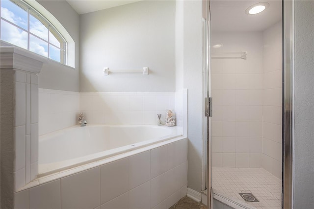 14614 Rannoch Moor Pl, Wimauma, FL 33598 - full bath with a bath, a stall shower, and tile patterned flooring