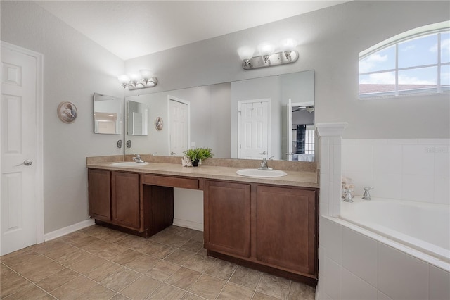 14614 Rannoch Moor Pl, Wimauma, FL 33598 - bathroom featuring double vanity and a garden tub