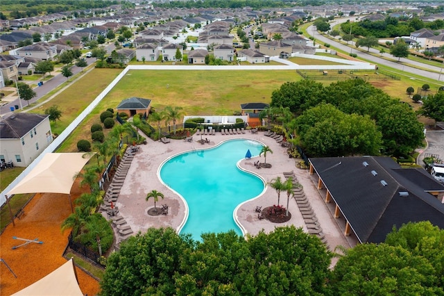 14614 Rannoch Moor Pl, Wimauma, FL 33598 - aerial perspective of suburban area with a pool area