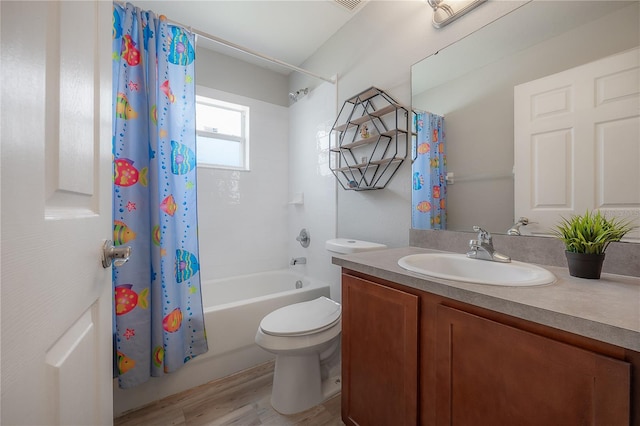 14614 Rannoch Moor Pl, Wimauma, FL 33598 - full bath with vanity, shower / tub combo with curtain, and wood finished floors
