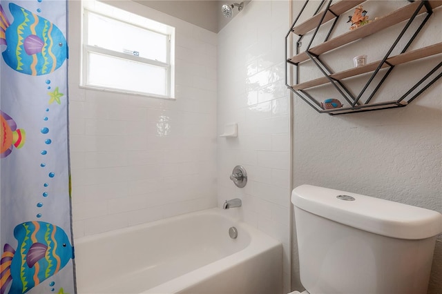 14614 Rannoch Moor Pl, Wimauma, FL 33598 - bathroom featuring shower / bath combination with curtain and a textured wall