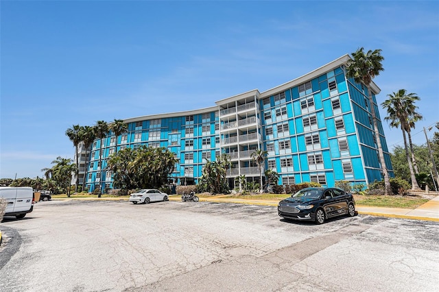 3315 58th Ave S Unit 605, Saint Petersburg, FL 33712 - view of apartment building / complex with uncovered parking