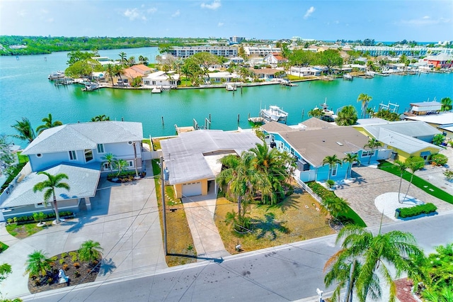 365 La Hacienda Dr, Indian Rocks Beach, FL 33785 - aerial perspective of suburban area with a nearby body of water