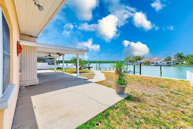 365 La Hacienda Dr, Indian Rocks Beach, FL 33785 - view of patio featuring a water view, a dock, and ceiling fan