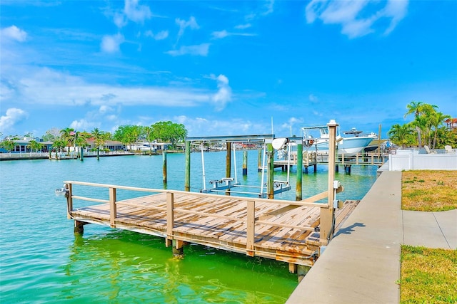 365 La Hacienda Dr, Indian Rocks Beach, FL 33785 - dock area featuring boat lift and a water view