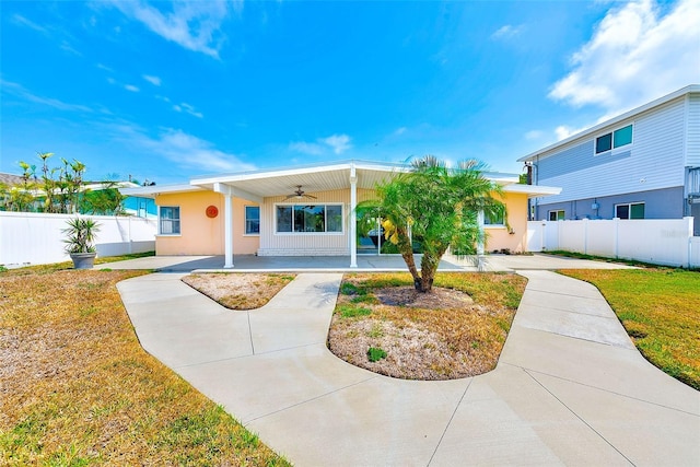 365 La Hacienda Dr, Indian Rocks Beach, FL 33785 - view of front facade with ceiling fan