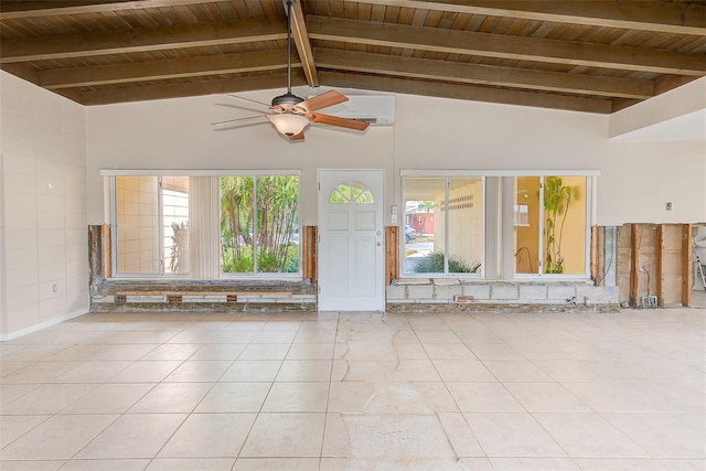 365 La Hacienda Dr, Indian Rocks Beach, FL 33785 - spare room featuring wooden ceiling, ceiling fan, light tile patterned floors, beamed ceiling, and high vaulted ceiling