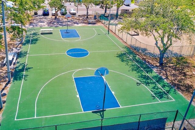 365 La Hacienda Dr, Indian Rocks Beach, FL 33785 - view of sport court featuring community basketball court and fence