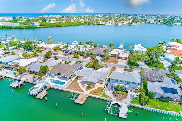 365 La Hacienda Dr, Indian Rocks Beach, FL 33785 - aerial perspective of suburban area featuring a large body of water