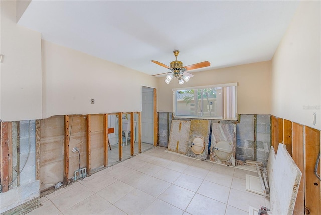365 La Hacienda Dr, Indian Rocks Beach, FL 33785 - tiled empty room featuring ceiling fan