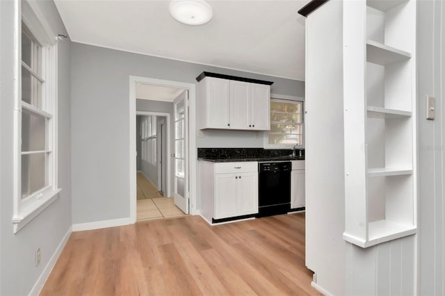 kitchen with open shelves, black dishwasher, white cabinetry, and light wood finished floors
