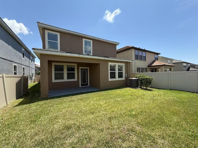 1022 Oliveto Verdi Ct, Brandon, FL 33511 - rear view of property featuring stucco siding, central AC, and a patio