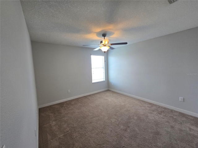 1022 Oliveto Verdi Ct, Brandon, FL 33511 - unfurnished room with a textured ceiling, a ceiling fan, carpet floors, and baseboards