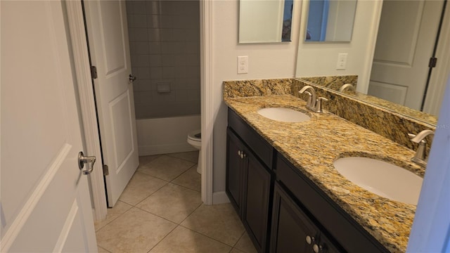 1022 Oliveto Verdi Ct, Brandon, FL 33511 - full bathroom with double vanity, tile patterned floors, toilet, and  shower combination