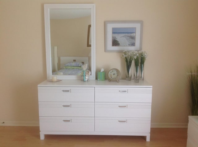 detailed view of wood finished floors and baseboards