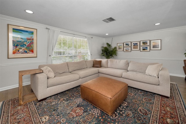 living area with crown molding, wood finished floors, baseboards, and recessed lighting