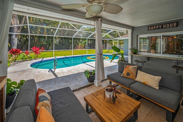 swimming pool with a patio area, outdoor lounge area, a ceiling fan, a lanai, and a lawn