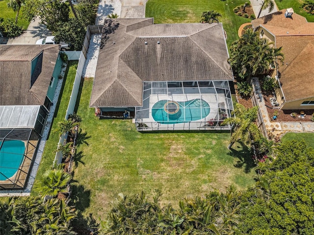 view of subject property with a pool area