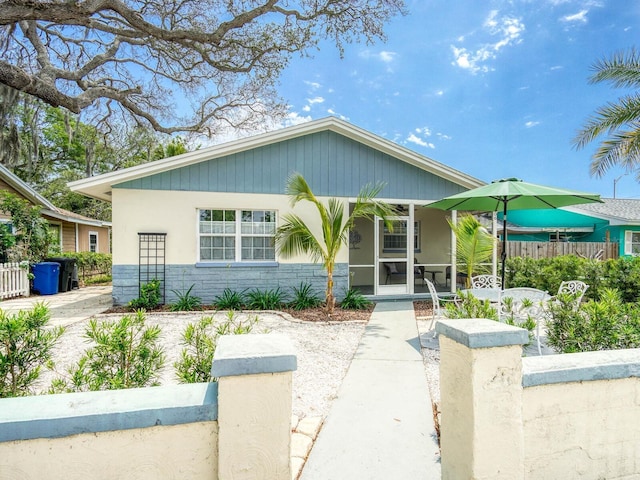 106 E Cedar St, Tarpon Springs, FL 34689 - view of front of home featuring stucco siding