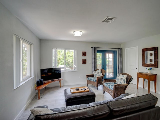106 E Cedar St, Tarpon Springs, FL 34689 - living room with baseboards and wood finished floors