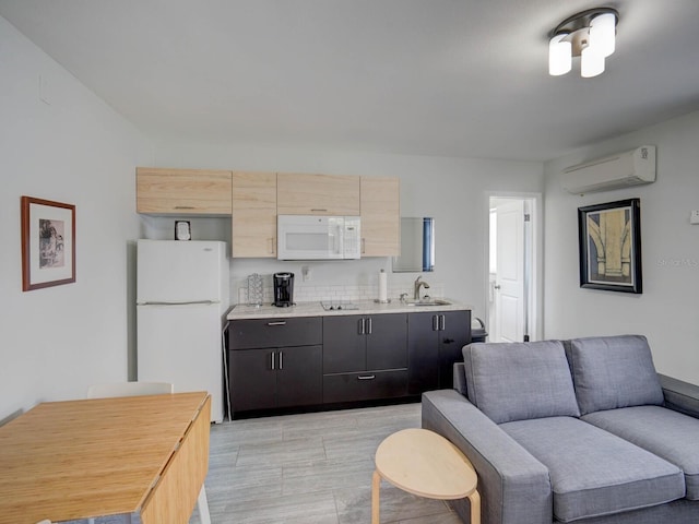106 E Cedar St, Tarpon Springs, FL 34689 - kitchen featuring white appliances, a wall mounted AC, a sink, light countertops, and open floor plan