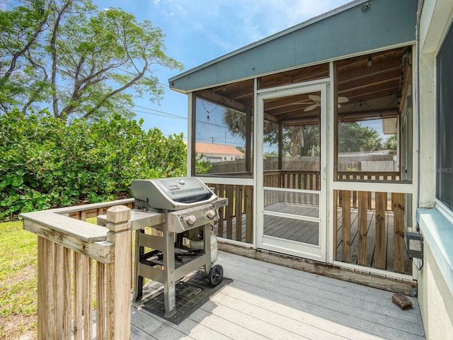 106 E Cedar St, Tarpon Springs, FL 34689 - wooden terrace featuring area for grilling and a sunroom