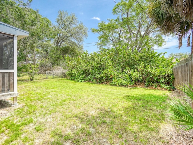 106 E Cedar St, Tarpon Springs, FL 34689 - view of yard with a sunroom
