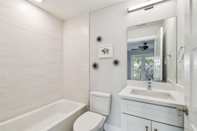 full bathroom with toilet, vanity, and shower / tub combination