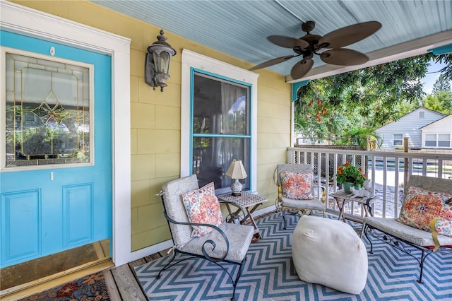 1038 Crescent Lake Dr N, Saint Petersburg, FL 33701 - view of patio featuring ceiling fan and covered porch