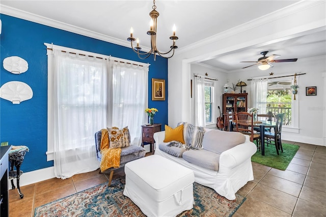 1038 Crescent Lake Dr N, Saint Petersburg, FL 33701 - tiled living room with a chandelier, baseboards, a ceiling fan, and crown molding