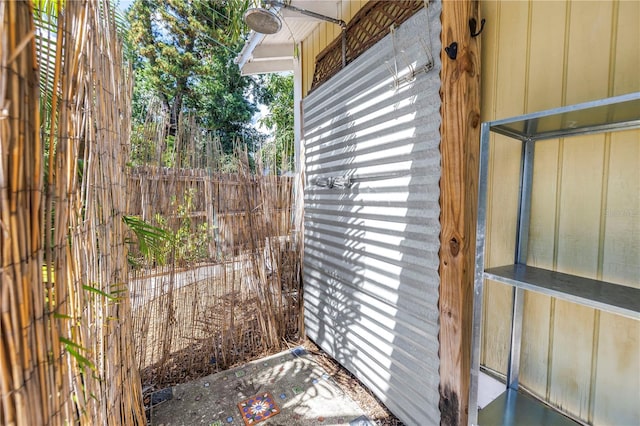 1038 Crescent Lake Dr N, Saint Petersburg, FL 33701 - view of exterior entry featuring fence