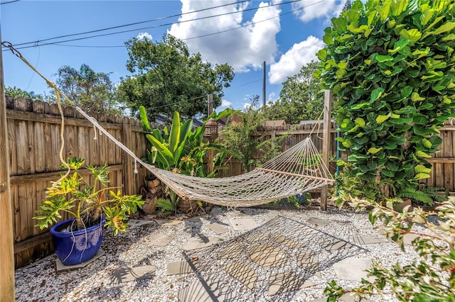 1038 Crescent Lake Dr N, Saint Petersburg, FL 33701 - view of patio featuring a fenced backyard
