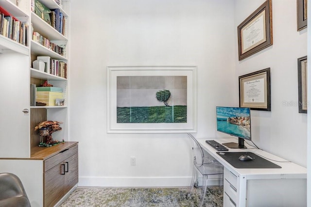 office space featuring baseboards
