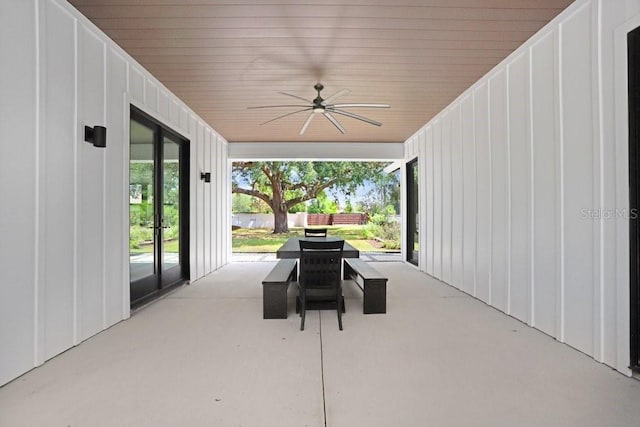 view of patio featuring a ceiling fan and french doors