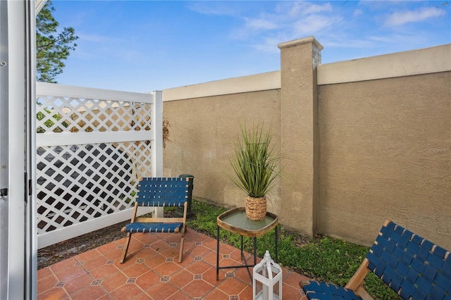 view of patio with fence