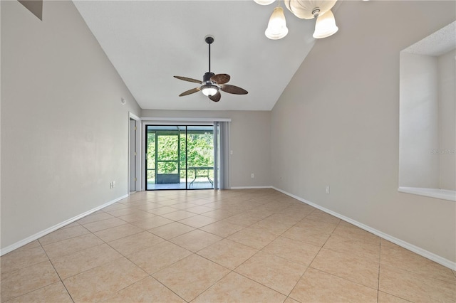 5100 Burchette Rd Unit 3005, Tampa, FL 33647 - spare room featuring light tile patterned flooring, ceiling fan, lofted ceiling, and baseboards