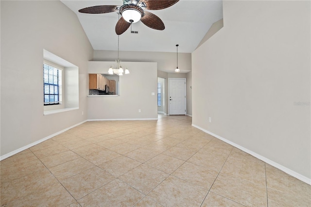 5100 Burchette Rd Unit 3005, Tampa, FL 33647 - spare room featuring high vaulted ceiling, a chandelier, plenty of natural light, light tile patterned flooring, and ceiling fan