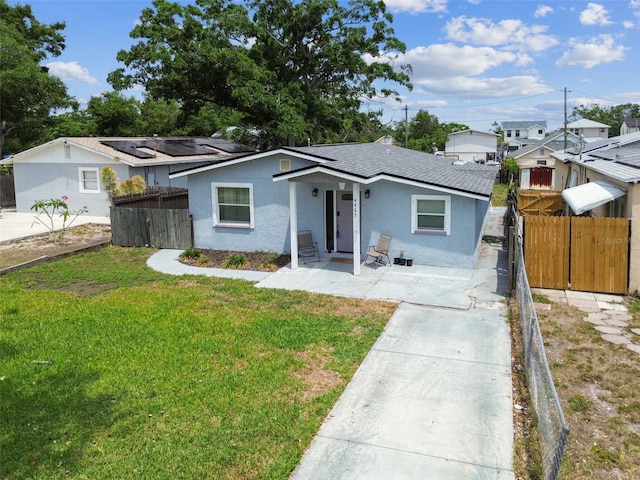 4465 56th Ave N, Saint Petersburg, FL 33714 - view of front of house featuring stucco siding, a shingled roof, and concrete driveway