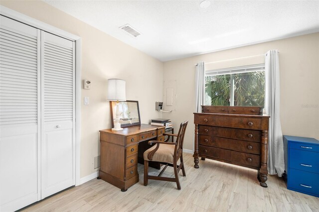 261 Kentucky Ave, Crystal Beach, FL 34681 - office featuring light wood-style floors and baseboards