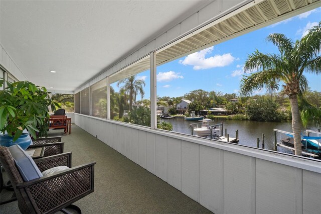 261 Kentucky Ave, Crystal Beach, FL 34681 - balcony featuring a water view